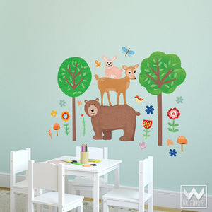 Decorate a child's playroom with removable wall decals and woodland animals
